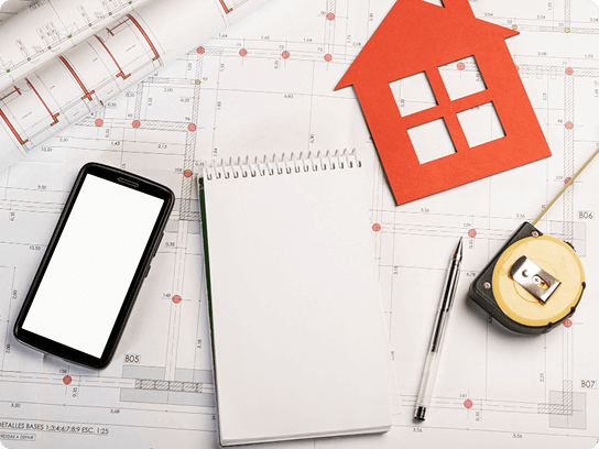 blueprint-with-notebook-and-smartphone